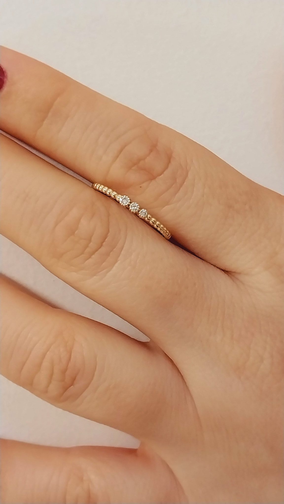 Celebrate your achievement with our elegant minimalist ring, designed to embody simplicity and sophistication. This timeless piece features a sleek, understated band that gracefully complements any style, serving as a perfect symbol of your hard work and dedication. Crafted from high-quality materials, this ring shines with a subtle brilliance that reflects the joy of graduation. Whether worn alone or stacked with other favorites, its delicate design makes it a versatile accessory for any occasion. Embrace your next chapter with this meaningful keepsake, a reminder of your journey and the bright future ahead.