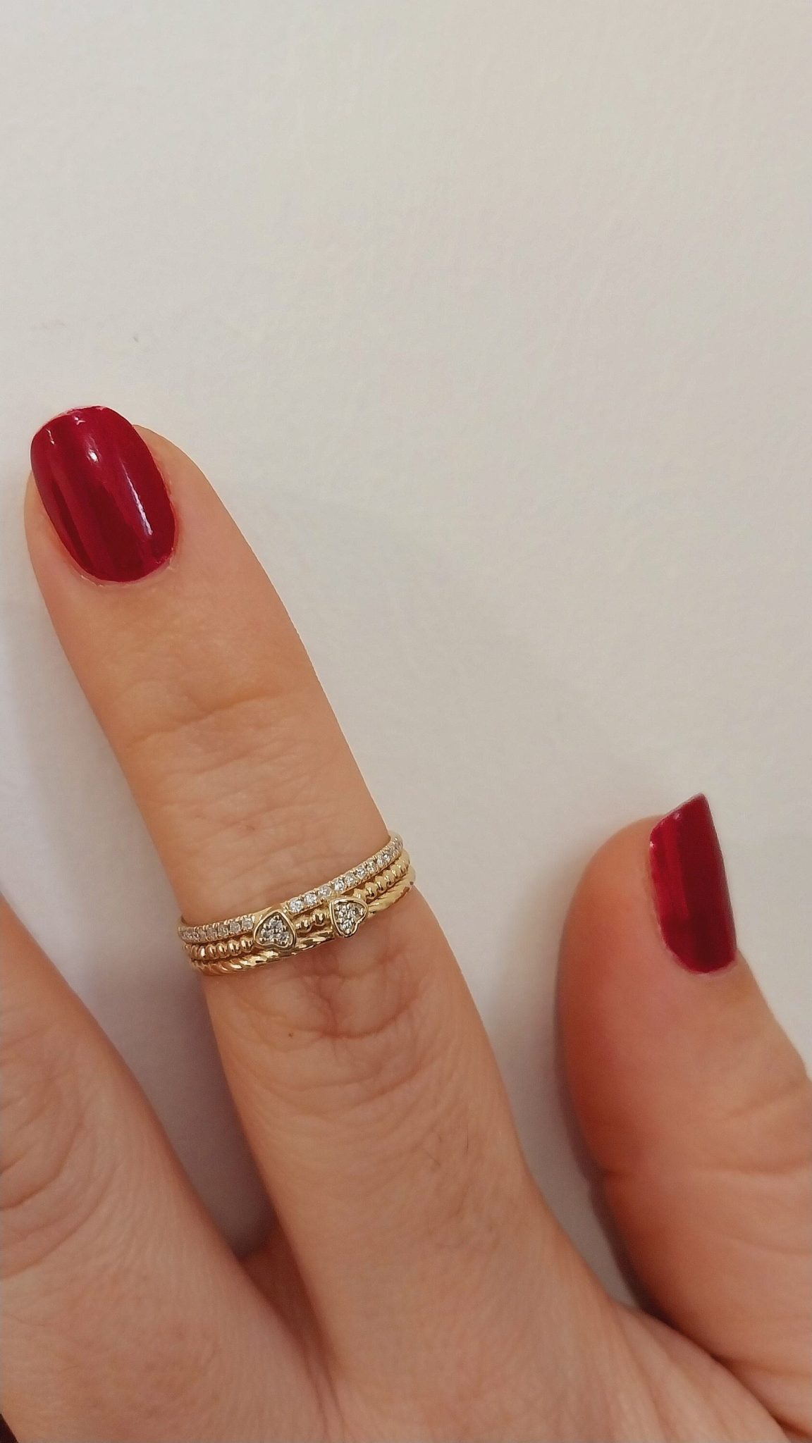 Introducing our Extraordinary Twisted Gold Ring, a stunning piece that artfully combines elegance and whimsy. This unique ring features a beautifully crafted twisted design that creates a mesmerizing interplay of light and shadow, enhancing its allure. At its center, a delicate heart motif serves as a symbol of love and devotion, making it the perfect statement piece for any occasion.